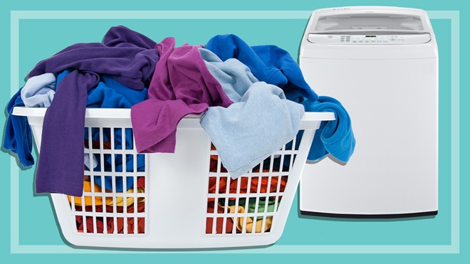 large_pile_of_clothes_in_washing_basket_and_washing_machine